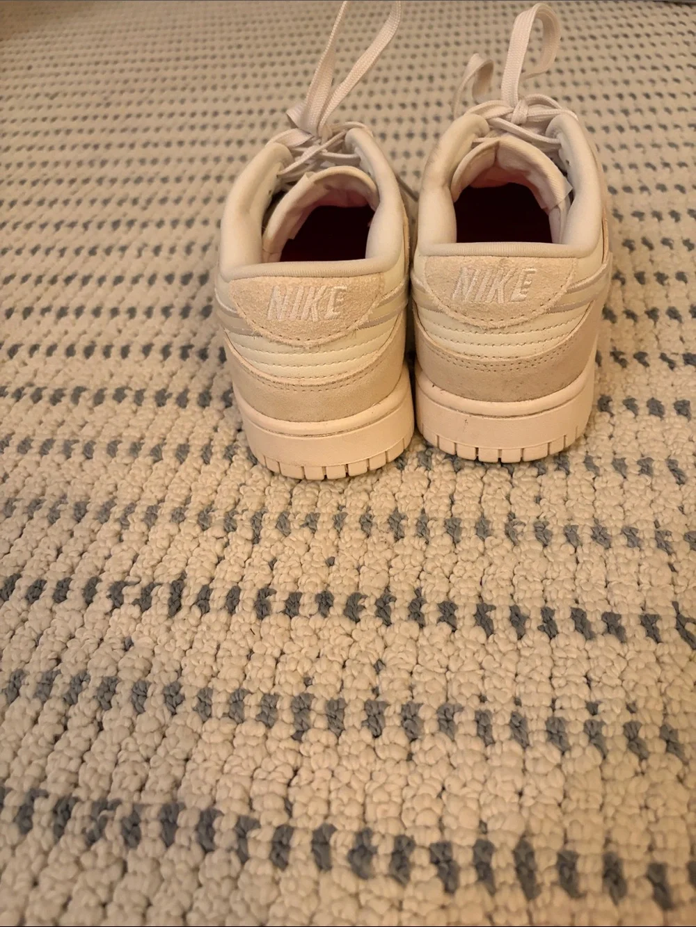 Nike women’s Low-Top Sneakers in Cream and White with Iridescent Swoosh